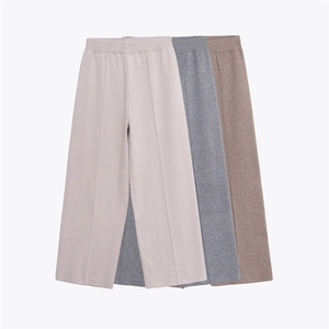 Women's high waist wide leg knit trousers in three neutral colors with center seam