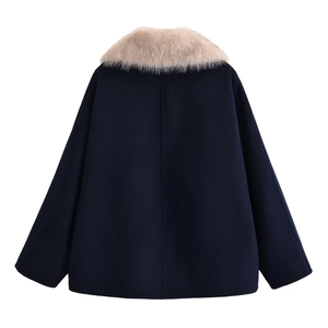 Rear view of navy blue wool jacket featuring a plush faux fur collar and A-line cut