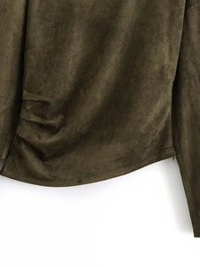 Detailed view of the olive green suede fabric showing ruched side texture and soft matte finish