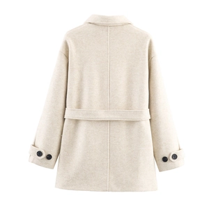Rear view of beige double-collar coat featuring a waist belt and contrast buttons