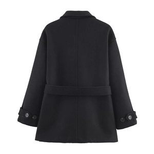 Rear view of black wool coat featuring decorative waist belt and buttoned cuff details