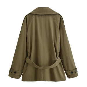 Detail view of olive green cargo windbreaker back with adjustable belt and cuff straps