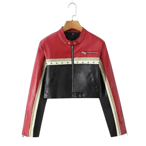Close-up of color-block PU leather biker jacket with zipper details and metallic studs