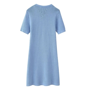 Rear view of light blue knitted dress with ribbed cuffs and hem and smooth drape