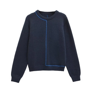 Women's crewneck knit sweater in dark blue with striking geometric light blue contrast lines