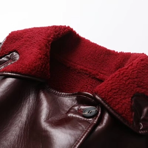 Chic burgundy faux leather jacket featuring vibrant red shearling collar and button detail