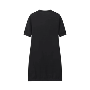Detailed flat lay of black knit dress showing ribbed edges and round neckline