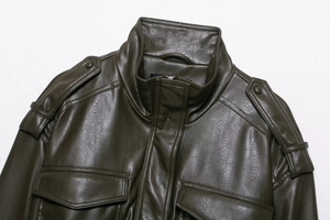 Detailed view of olive green PU jacket featuring stand collar, epaulets, and flap pockets
