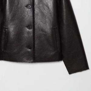 Women's 2025 chic reversible faux leather jacket with fur lining and button closure