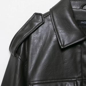 Fashionable black PU leather jacket featuring stylish shoulder epaulettes and lapel details