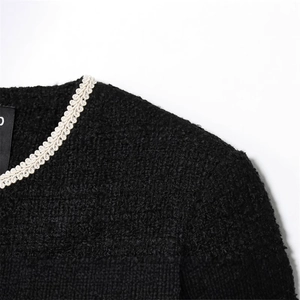 Veste en tweed noir pour femme avec bordures tressées blanches et coupe ample chic
