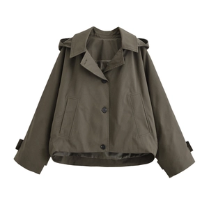 Detail of dark olive green hooded jacket showing buttons, large pockets and fabric texture