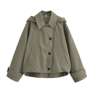Detailed view of olive green hooded poncho jacket with large lapels and horn buttons