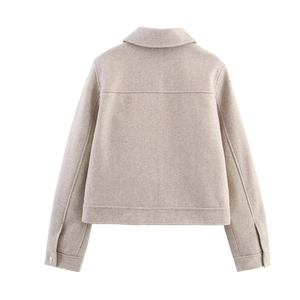 Back view of a minimalist oatmeal cropped jacket in textured wool blend fabric