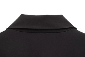 Detail shot showing the smooth collar stitching and fine plain weave of this black jacket