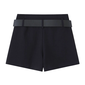 Flat lay of high-waist black A-line shorts featuring a matching wide belt and woven fabric