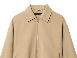 Detailed view of khaki zip-up jacket with spread collar and premium twill texture