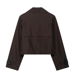 Short dark brown trench jacket for women featuring back storm flap and stylish cropped cut