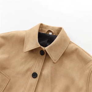 Women's camel faux suede jacket with classic lapel and black buttons in a front view