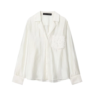 White long sleeve button-down shirt for women with embroidered pocket and lapel collar