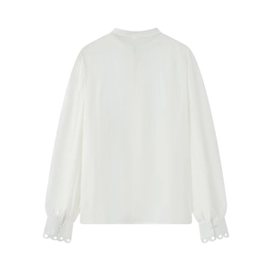 Rear view of white stand-collar blouse featuring lantern sleeves with hollowed wavy lace cuffs