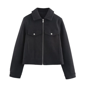 Women's black wool-like zipper jacket with lapel collar and flap pockets in a minimalist style