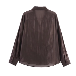 Detailed back view of dark coffee long sleeve shirt showing satin texture and cuff detail