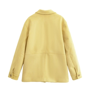 Back view of yellow suede lapel jacket with cross seam stitching and sleeve buttons