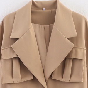 Khaki peak lapel jacket with cargo pockets and structured design for women
