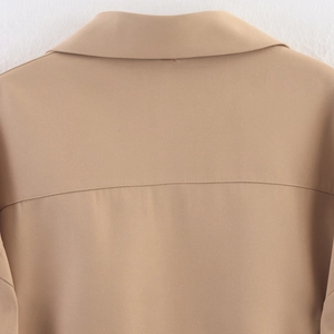 Women's khaki twill jacket with classic lapel collar and durable reinforced stitching