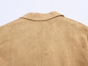 Detail showing high-quality stitching on back seam of brown faux suede jacket coat