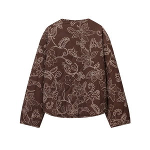Detailed back view of dark brown quilted jacket featuring white floral paisley embroidery