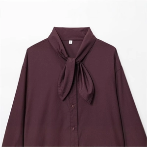 Elegant burgundy pussy-bow poplin shirt with long sleeves and front button detail