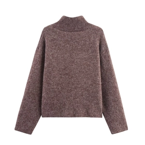 Detail shot of a dark coffee knit sweater with mock neck and soft mohair texture