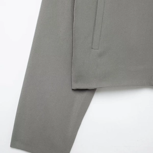 Women's grey hooded short jacket with side pockets and fine twill fabric detail