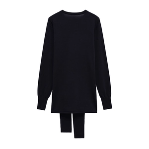 Women's two-piece knit set featuring a crewneck long sleeve top and matching leggings