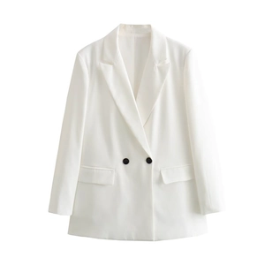 Flat lay of white double-breasted blazer with peaked lapels and black button details