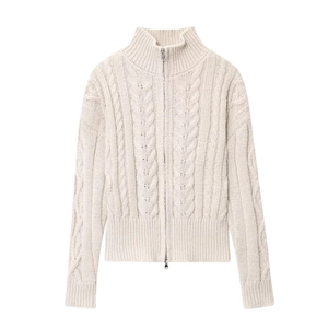 Women's cream-colored cable knit sweater featuring a stand collar and metal dual zippers