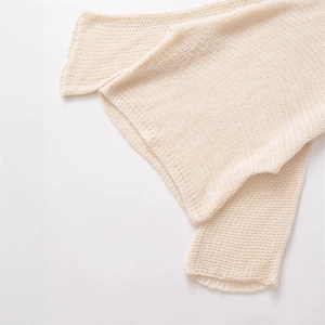 Minimalist cream knit sweater in open-work mesh fabric with a soft textured finish