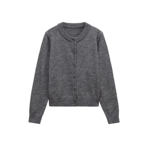 Detail of grey crewneck knit cardigan with button-down front and ribbed texture