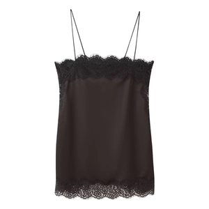 Detail shot of black satin camisole featuring delicate eyelash lace trim on the neckline