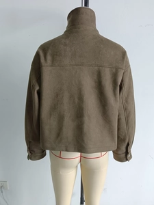 Rear view detail of dark brown faux suede jacket with yoke stitching and stand collar