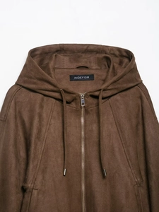 Detail of hooded pilot jacket with dark brown suede effect and metal zipper puller