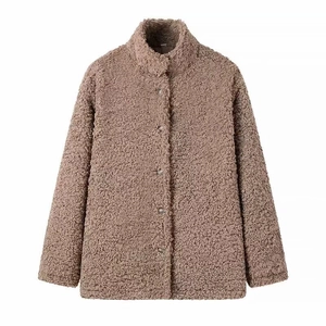 Detail shot of brown teddy fleece jacket featuring stand collar and button-down front
