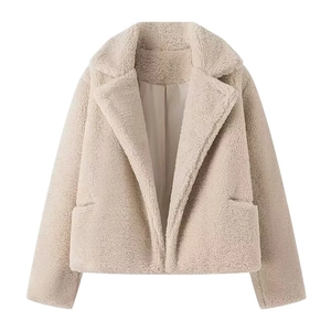 Short beige faux fur jacket with stylish lapel collar and front pockets for women
