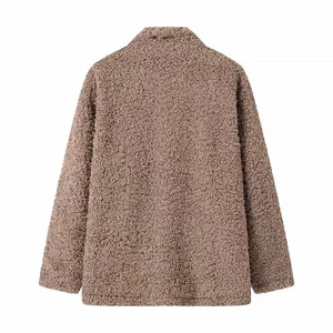 Rear view of brown plush fleece jacket showing loose fit and stand collar texture