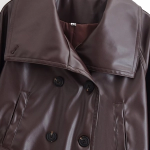 Women's dark brown short leather trench coat with large lapel and double-breasted buttons