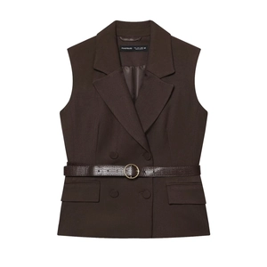 Detail view of dark brown double-breasted vest with textured animal print belt and gold buckle