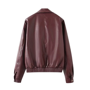 Back view of burgundy leather jacket featuring a lapel collar and elastic waist hemline
