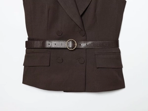Detail of dark brown vest with double-breasted buttons and embossed leather belt